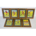 A collection of seven framed humorous vintage golf prints.