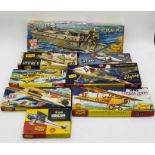 A collection of six vintage boxed The Lindberg Line plastic model airplane kits including Douglas