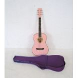 A Nevada (model WG309 PNK) 1/2 size pink acoustic guitar with soft carry case