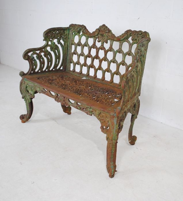 A Victorian weathered cast iron bench with ornate detailing - length 110cm - Image 4 of 7