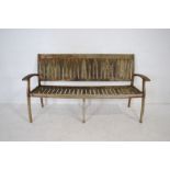 A 'Danish Scancraft Design' weathered wooden garden bench - length 172cm