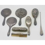 A collection of hallmarked silver dressing table brushes, mirrors etc.