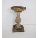 A weathered reconstituted stone sectional bird bath - height 72cm