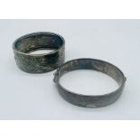A hallmarked silver hinged bracelet along with one other SCM bracelet engraved with a bird in