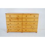 A pine chest of ten drawers - two handles missing - length 155cm, depth 42cm, height 98cm