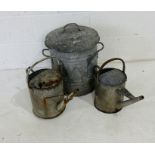 Two vintage galvanised watering cans, along with a galvanised lidded bin