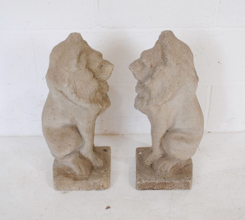 A pair of reconstituted stone garden ornaments in the form of lions - height 56cm - Image 6 of 6