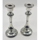 A pair of hallmarked silver candlesticks, height 25cm