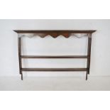 A Georgian oak wall hanging plate rack - length 152cm, height 104cm