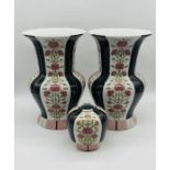 A large pair of Fabienne Jouvin porcelain vases (height 41cm) and matching smaller vase (height