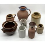 A collection of stoneware jars, terracotta jugs and studio pottery