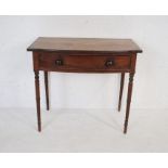 A mahogany bow-fronted hall table with single drawer, raised on turned legs - length 88cm, depth