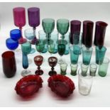 A collection of various coloured glass including goblets, beakers, bon bon dishes etc.