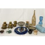 A collection of studio pottery including a large plate by Andrew Lloyd etc