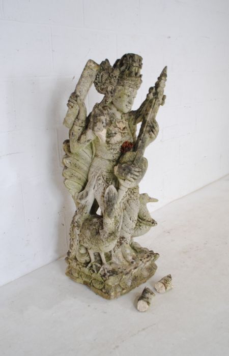 A weathered Balinese lava stone statue of a deity - two pieces loose but present, A/F - height - Image 2 of 8