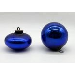 Two antique blue glass witches balls one of smaller form