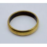 An 18ct gold wedding band, weight 6.1g