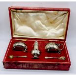 A cased hallmarked silver condiment set (case A/F)