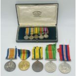 A group of 5 WWI & WWII medals with corresponding miniatures awarded to 2nd Lieutenant JW McWalter
