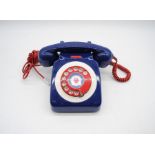 A retro 'mod' dial telephone