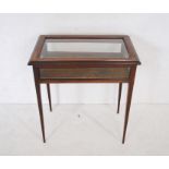 An Edwardian inlaid bijouterie table raised on tapered legs - length 67cm, depth 41cm, height 73cm