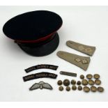 A collection of military badges, buttons, officer's pips etc including Royal Sussex Regiment,