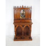 An ecclesiastical style oak hall stand with Gothic style carvings - length 85cm, depth 45cm,