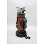A novelty telephone in the form of a bag of golf clubs