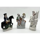 A collection of Staffordshire figures/spill vases including Dick Turpin (A/F), Scottish drummer etc.