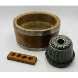 A vintage wooden metal bound cheese mould, with a blancmange mould etc