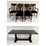 An Italian dining table along with a set of six matching chairs including two carvers by Pietro