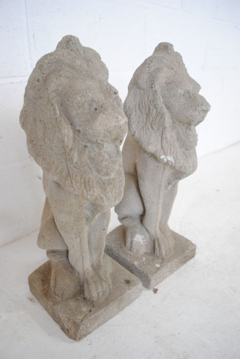 A pair of reconstituted stone garden ornaments in the form of lions - height 56cm - Image 5 of 6