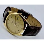 An Omega Seamaster Quartz gold plated and stainless steel gentleman's wristwatch, champagne dial