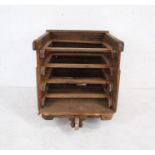 A shelved industrial wooden crate - from Axminster Carpets - length 71cm, depth 84cm, height 77cm