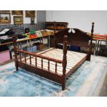 A mahogany double bed
