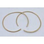 A pair of 18ct gold (tested) bangles- A/F, weight 16.8g