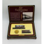 A boxed Hornby Railways OO gauge Ex-Caledonian L.M.S 4-4-2 steam locomotive (14010) with tender