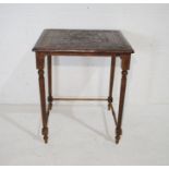 An Eastern leather topped occasional table with Greek key pattern design
