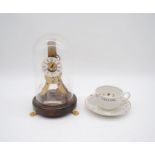 A J & G Meakin fortune telling cup and saucer along with an anniversary clock named to 'Julian