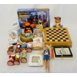 A collection of various games, children's toys and money boxes including a Harry Potter & The