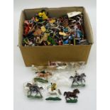 A large collection of various plastic toy figures including Vikings, romans, pirates, cowboys,