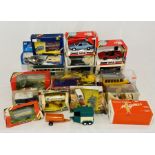 A collection of various boxed die-cast vehicles and farming equipment including Britians, Tonka,