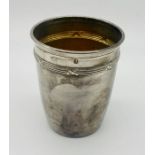 A French silver beaker with gilded interior, weight 42.8g