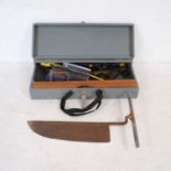 A carpenters tool trunk containing various tools and planes including Record No 7, Record No 5 1/