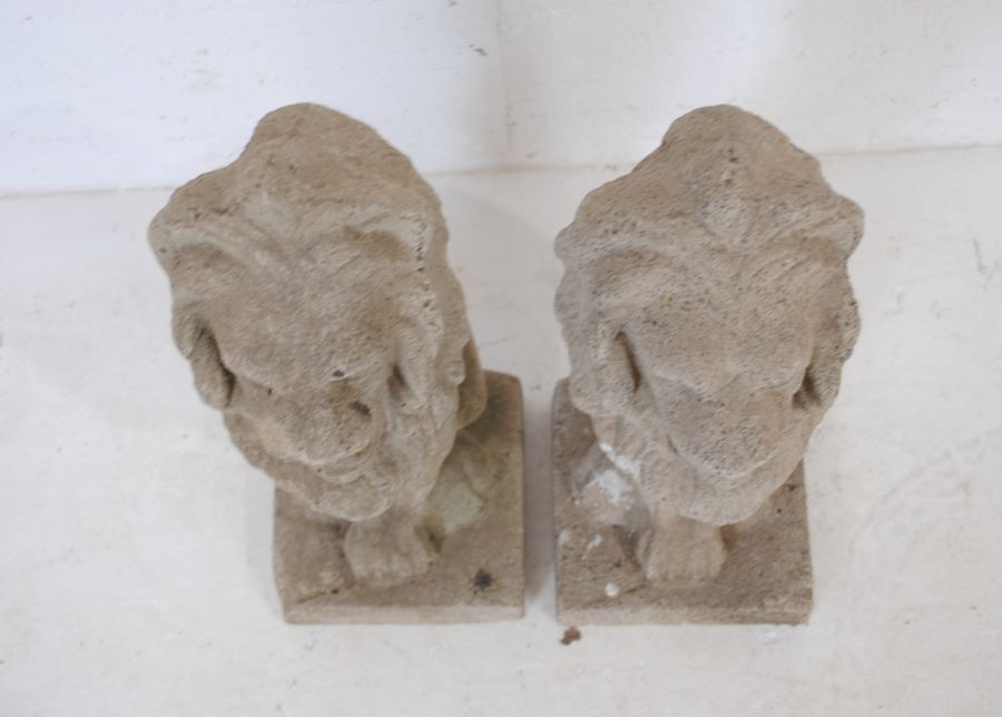 A pair of reconstituted stone garden ornaments in the form of lions - height 56cm - Image 4 of 6