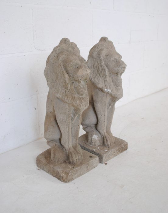 A pair of reconstituted stone garden ornaments in the form of lions - height 56cm - Image 2 of 6