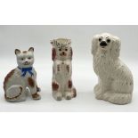 A collection of Staffordshire including reproduction spaniel jug, cat etc.