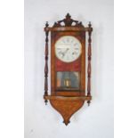 A turn of the century chiming inlaid wall clock with carved detailing, the dial named to 'Kay and