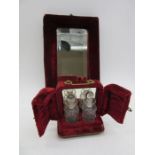 A Victorian velvet mirror with small shelf below along with a velvet vanity case with two scent