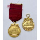 Two 15ct gold medallions- both from the "Incorporated Society of Licensed Victuallers School" (